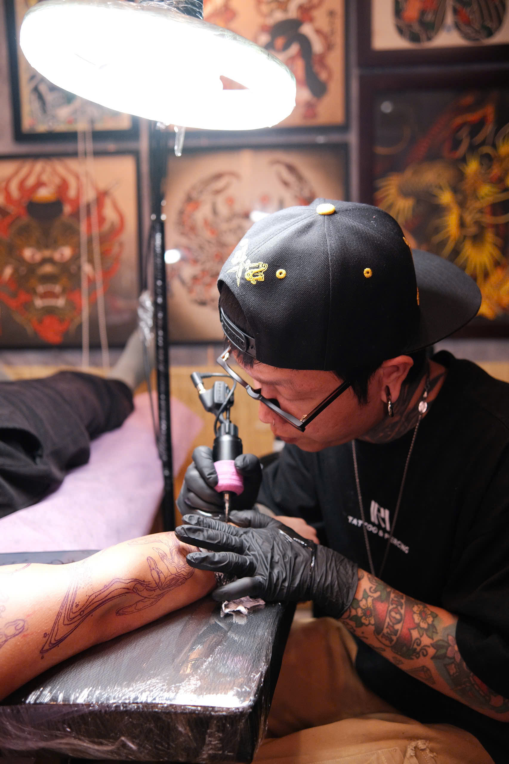 IRI Tattoo artist at work
